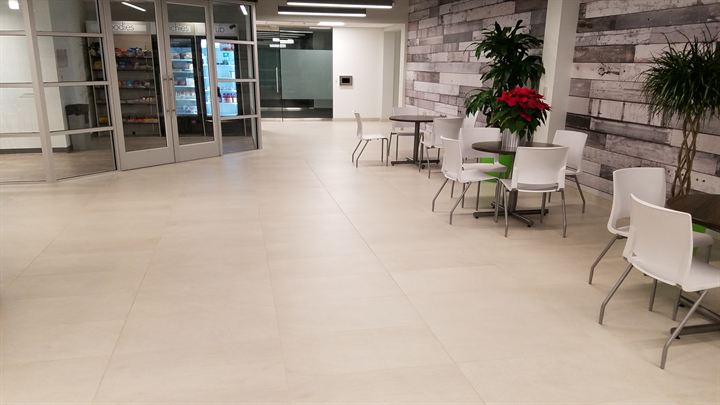 Café seating area with a light tile floor